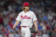 Philadelphia Phillies starting pitcher Aaron Nola leaves the game against the Arizona Diamondbacks during the fifth inning in Game 6 of the baseball NL Championship Series in Philadelphia Monday, Oct. 23, 2023. (AP Photo/Matt Slocum)