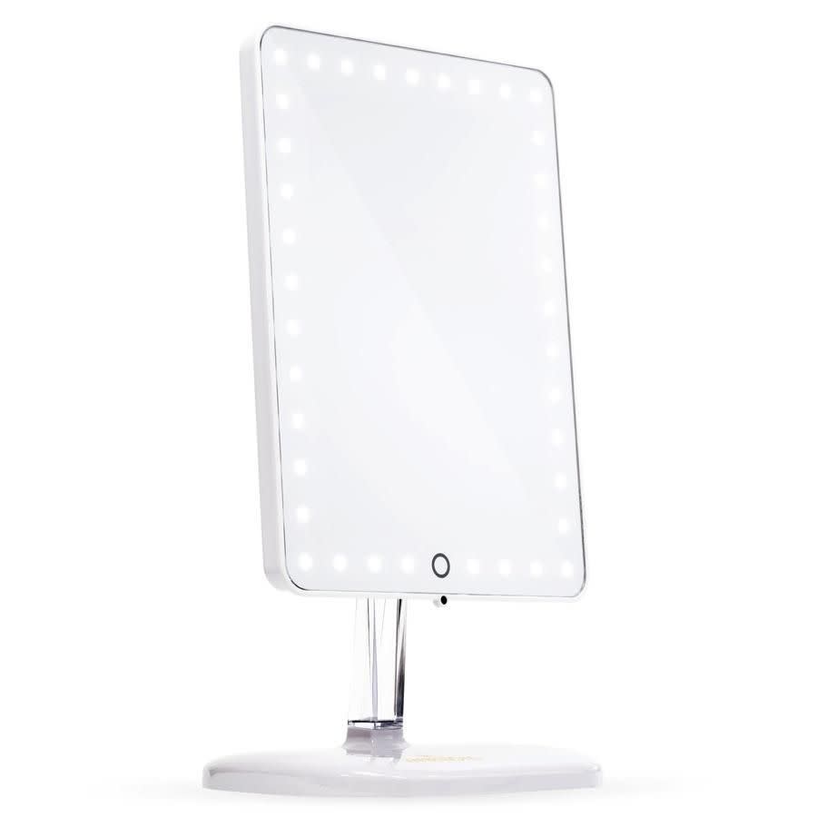 <p><a href="https://go.redirectingat.com?id=74968X1596630&url=https%3A%2F%2Fwww.ulta.com%2Ftouch-pro-led-makeup-mirror-with-bluetooth-usb-charger%3FproductId%3DxlsImpprod18851268&sref=https%3A%2F%2Fwww.seventeen.com%2Flife%2Fschool%2Fadvice%2Fg1024%2Fcollege-packing-list%2F" rel="nofollow noopener" target="_blank" data-ylk="slk:Shop Now;elm:context_link;itc:0;sec:content-canvas" class="link rapid-noclick-resp">Shop Now</a></p><p>Touch Pro LED Makeup Mirror With Bluetooth & USB Charger</p><p>$119.00</p><p>ulta.com</p>