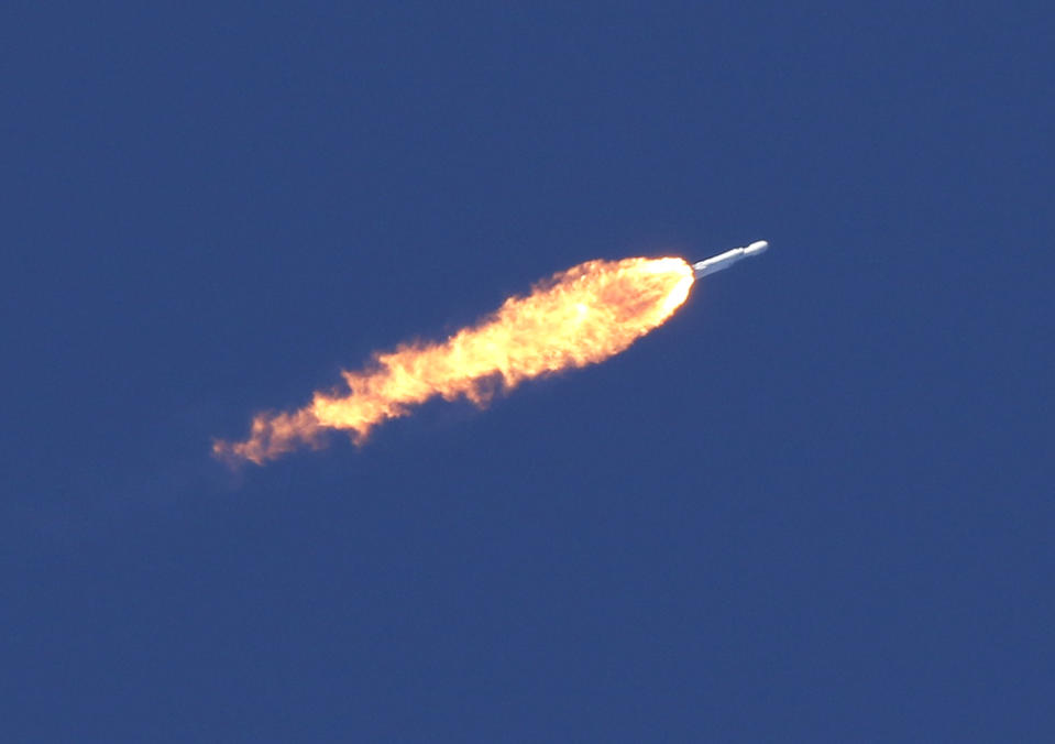 <p>A SpaceX Falcon Heavy rocket trails flames after lifting off from historic launch pad 39-A at the Kennedy Space Center in Cape Canaveral, Fla., Feb. 6, 2018. (Photo: Thom Baur/Reuters) </p>