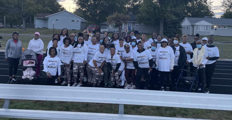 Melanin Walkers posing for a photo