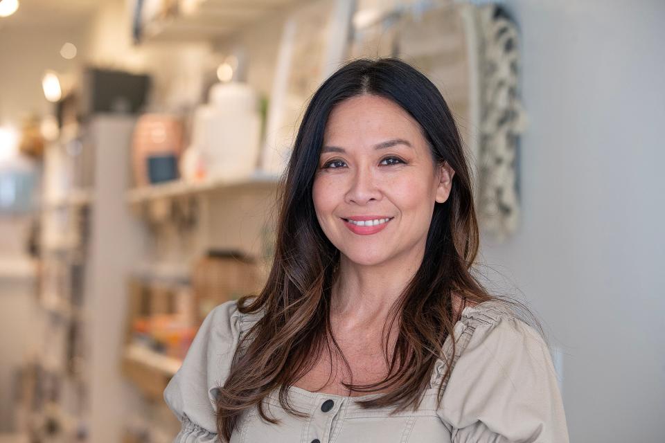 Christina Kim, owner of Christina Kim Interior Design, an interior design firm founded in 2012, works in her studio in Manasquan, NJ Monday, January 9, 2023. 