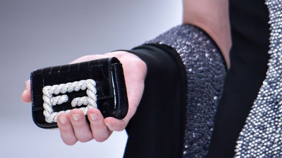 Fendi's mini Baguette bags made their debut, featuring elaborate detailing. - Victor Virgile/Gamma-Rapho/Getty Images