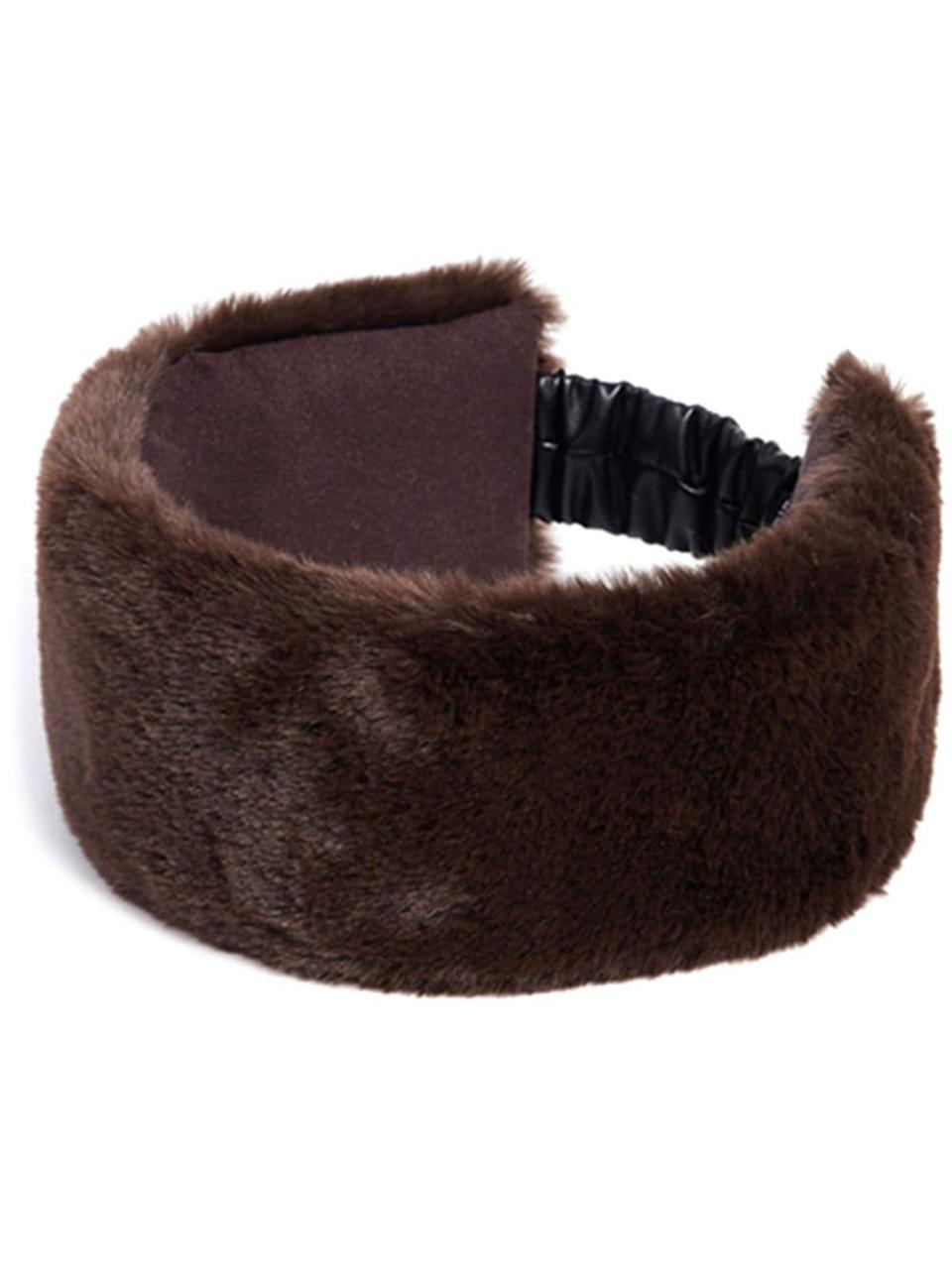 <p><a href="https://go.redirectingat.com?id=74968X1596630&url=https%3A%2F%2Fwww.farfetch.com%2Fshopping%2Fwomen%2Fapparis-faux-fur-hair-band-item-20900053.aspx%3Fstoreid%3D12501&sref=https%3A%2F%2Fwww.harpersbazaar.com%2Ffashion%2Ftrends%2Fg4452%2Fgifts-under-100%2F" rel="nofollow noopener" target="_blank" data-ylk="slk:Shop Now;elm:context_link;itc:0;sec:content-canvas" class="link ">Shop Now</a></p><p>Faux-Fur Hair Band</p><p>farfetch.com</p><p>$60.00</p><span class="copyright">farfetch.com</span>