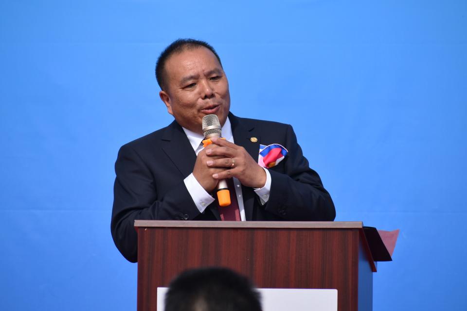 Huabin Lin, chairman of 72 Steel, speaks at a groundbreaking ceremony for the company's new advanced manufacturing facility in Aliquippa.