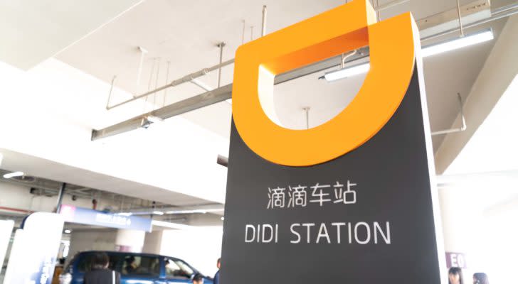 A sign for a Didi (DIDI) ride-hailing station.