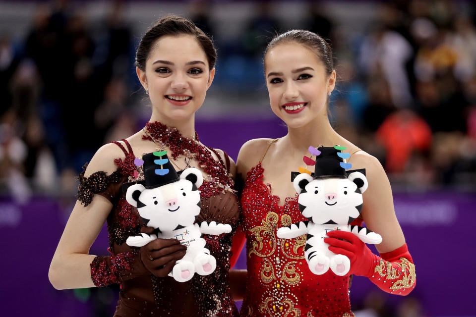 <p>Silver medal winner Evgenia Medvedeva of Olympic Athlete from Russia (L) and gold medal winner Alina Zagitova of Olympic Athlete from Russia celebrate during the victory ceremony for the Ladies Single Skating Free Skating on day fourteen of the PyeongChang 2018 Winter Olympic Games at Gangneung Ice Arena on February 23, 2018 in Gangneung, South Korea. (Photo by Richard Heathcote/Getty Images) </p>