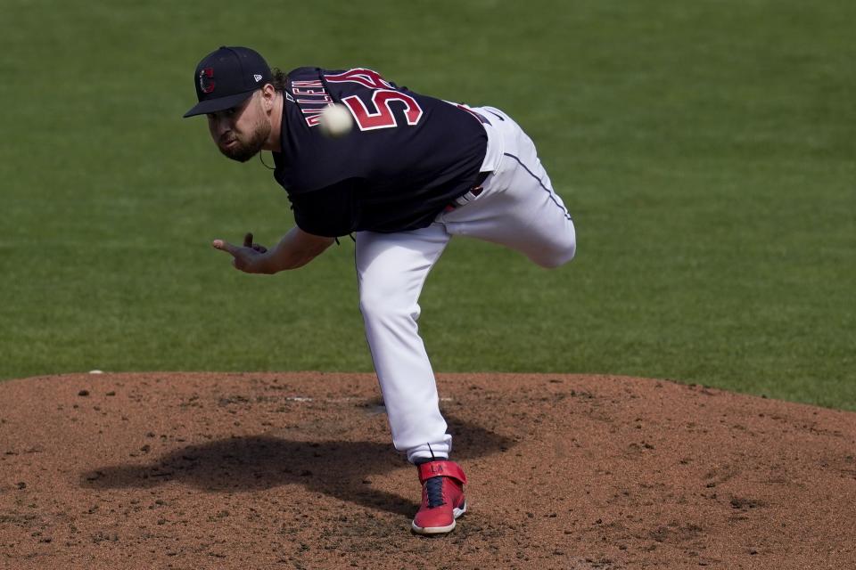 Cleveland Indians starting pitcher Logan Allen throws against the Oakland Athletics during the second inning of a spring training baseball game Monday, March 15, 2021, in Goodyear, Ariz. (AP Photo/Ross D. Franklin)