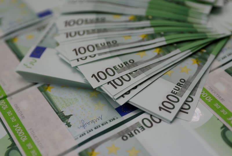 FILE PHOTO: 100 Euro Banknotes are seen at the Money Service Austria company's headquarters in Vienna