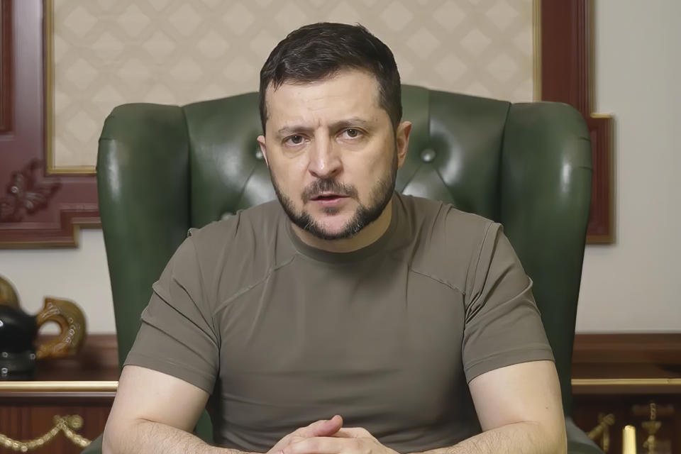 In this image from video provided by the Ukrainian Presidential Press Office, Ukrainian President Volodymyr Zelenskyy speaks from Kyiv, Ukraine, Tuesday, April 12, 2022. (Ukrainian Presidential Press Office via AP)