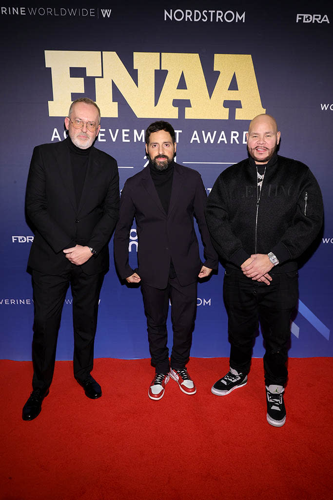 (L-R) Creative Director GQ Jim Moore, Designer, Kith, Ronnie Fieg, and Fat Joe attend the 35th Annual Footwear News Achievement Awards on November 30, 2021 in New York City. - Credit: Getty Images for Footwear News