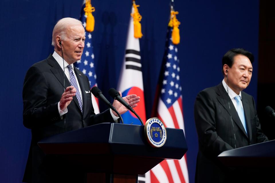 U.S. President Joe Biden, left, speaks as South Korean President Yoon Suk Yeol listens during a news conference at the People's House inside the Ministry of National Defense, Saturday, May 21, 2022, in Seoul, South Korea.