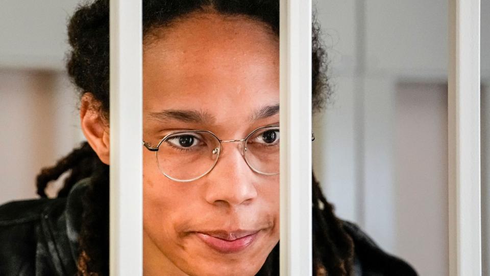 Star and two-time Olympic gold medalist Brittney Griner speaks to her lawyers standing in a cage at a court room prior to a hearing, in Khimki just outside Moscow, Russia, . American basketball star Brittney Griner returns Tuesday to a Russian courtroom for her drawn-out trial on drug charges that could bring her 10 years in prison of convicted Russia Griner, Moscow, Russian Federation - 26 Jul 2022