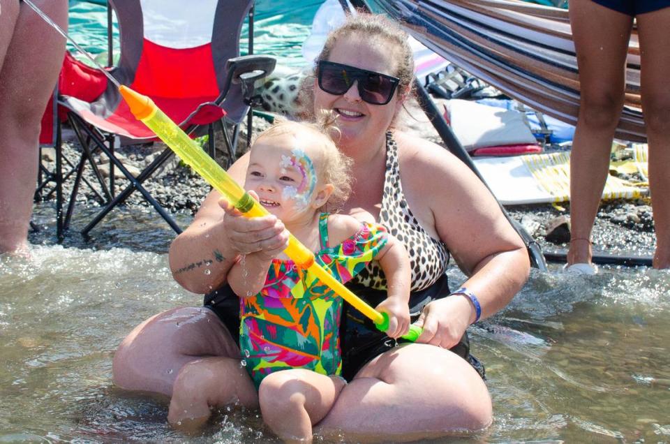 The Columbia River provided a cool refuge for families who came out championship Sunday, July 30, 2023, to watch the final hydroplane races of the Water Follies 2023 Columbia Cup. Eric Rosane/erosane@tricityherald.com