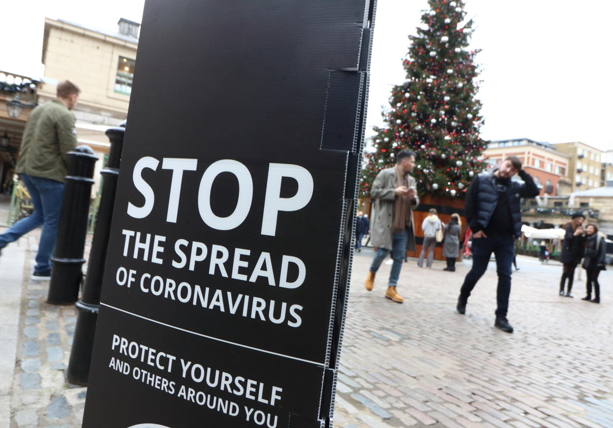  A 'Stop the spread of Coronavirus' sign seen in Covent Garden. It looks increasingly likely that London will be moved up to Tier 3 of Covid-19 restrictions before Christmas. It was announced that London now has the highest Coronavirus infection rate in England, so when the Tiers are reviewed next week, London fears the worst. Tier 3 will mean bars, pubs, cafes, restaurants, must close except for takeaway, delivery and click and collect services, meaning a very un-Merry Christmas for the capital. (Photo by Keith Mayhew / SOPA Images/Sipa USA) 