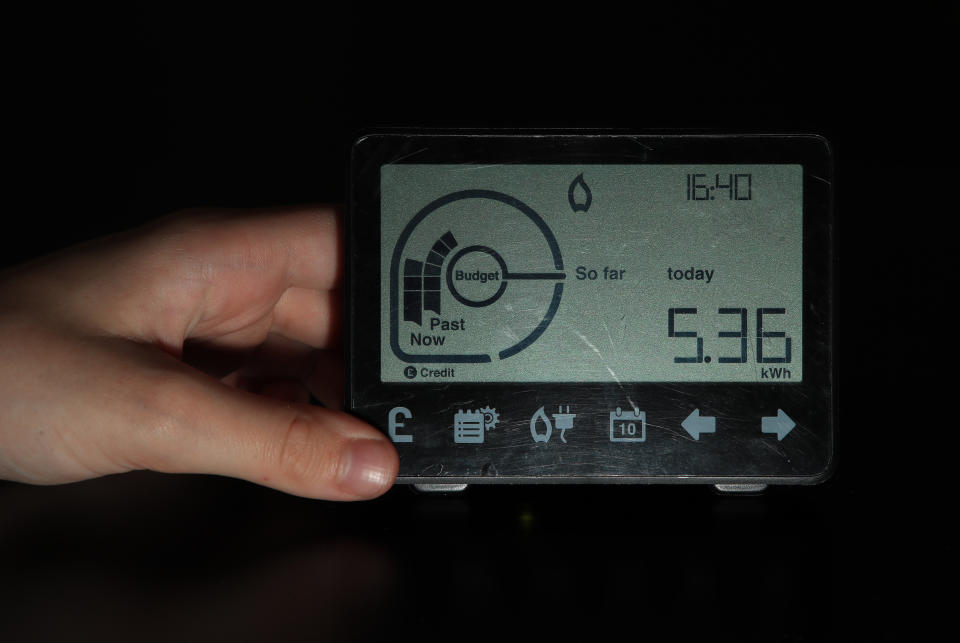 A person holds a smart meter. (Photo by Peter Byrne/PA Images via Getty Images)