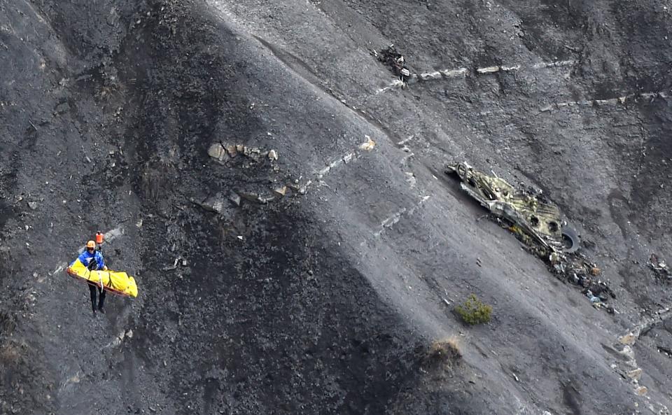 On March 24, a&nbsp;Germanwings commercial flight&nbsp;carrying 150 people&nbsp;from Barcelona,&nbsp;Spain, to Dusseldorf, Germany, <a href="http://www.huffingtonpost.com/2015/03/24/germanwings-plane-crash_n_6930028.html">crashed in the French Alps</a> with <a href="http://www.huffingtonpost.com/2015/03/25/germanwings-crash-victims_n_6939326.html">no known survivors</a>. Andreas Lubitz, one of the flight's pilots, had a <a href="http://www.huffingtonpost.com/2015/04/29/germanwings-andreas-lubitz-mental-health-faa_n_7175134.html">history of mental illness</a>, and prosecutors said he appeared to have <a href="http://www.huffingtonpost.com/2015/03/26/germanwings-crash-co-pilot_n_6946262.html">crashed the plane deliberately</a>. In this photo, an investigator&nbsp;passes by scattered debris at the crash site two days after the&nbsp;tragedy.