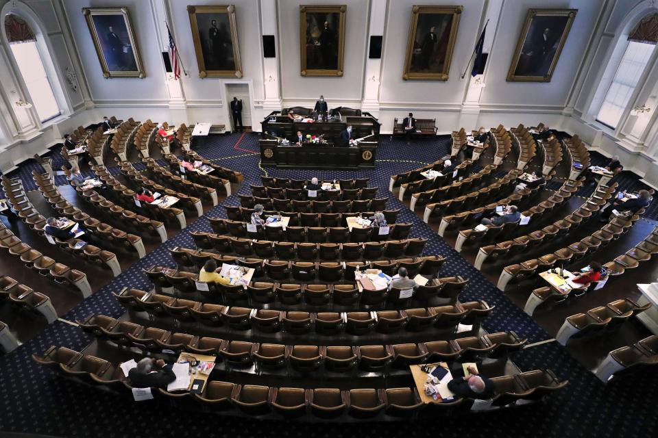 Members of the New Hampshire Senate gather for a session on June 16, 2020, at the State House in Concord, New Hampshire. [AP photo/Charles Krupa]