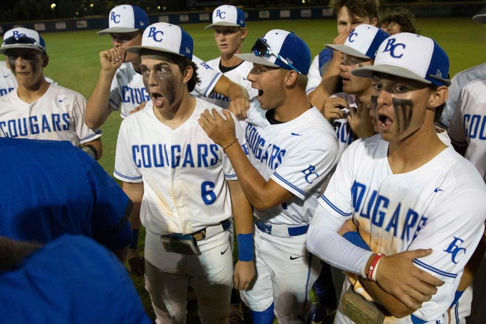 Barron Collier reacts after hearing the score of the Naples High School quarterfinal after defeating Archbishop McCarthy 3-2 in the FHSAA baseball Class 5A-Region 4 quarterfinal, Tuesday, May 10, 2022, at Barron Collier High School in Naples, Fla.