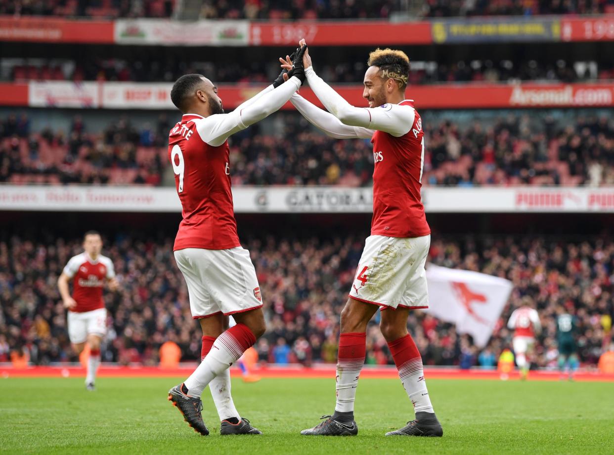 Strike force: Aubaeyang is happy to sacrifice his lead role to accommodate Lacazette in the Arsenal XI: Getty Images