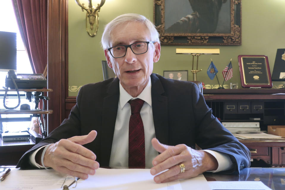 Wisconsin Gov. Tony Evers speaks during an interview with The Associated Press Wednesday, Dec. 4, 2019 in his Statehouse office in Madison, Wis. Evers says that in the wake of two school shootings at separate Wisconsin high schools the "state has to step up and help" school districts provide more mental health services for students. Evers spoke about his hope to work with Republicans to secure more funding. (AP Photo/Scott Bauer )