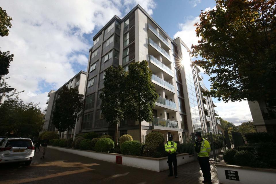 Police outside Golden Mile House in Clayponds Lane, Brentford, where the victims were found (PA)