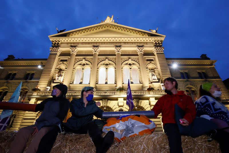 Climate change activists take part in a demonstration called "Rise up for change" in Bern