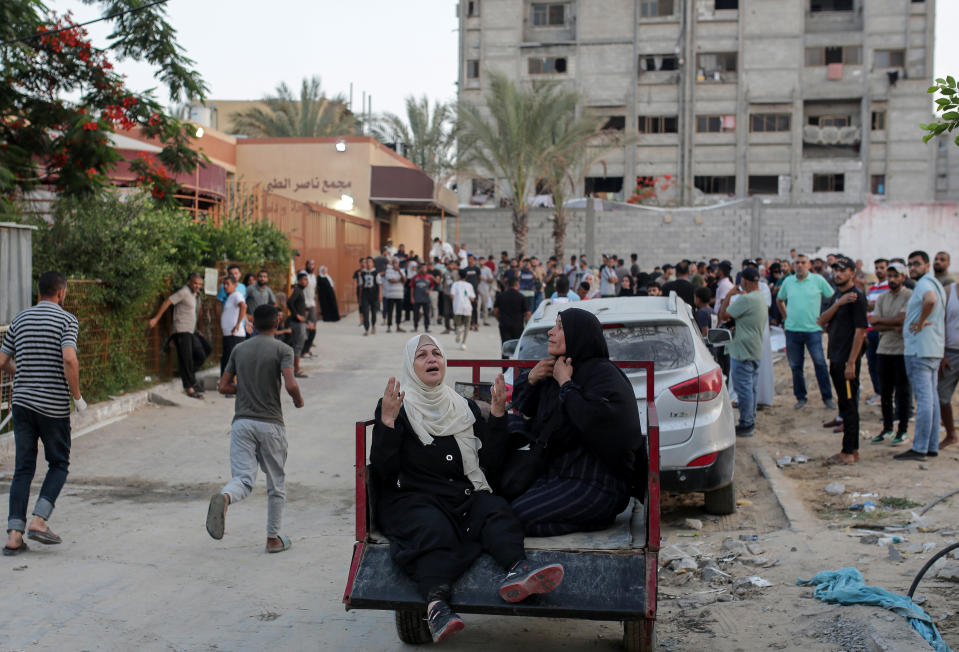 RAFAH, GAZA - JUNE 21: Displaced Palestinians mourn during funeral ceremony of their relatives after Israeli airstrike killed 25 and injured 50 people at Al-Nasr Hospital in al-Mawasi neighborhood of Rafah, Gaza on June 21, 2024. (Photo by Jehad Alshrafi/Anadolu via Getty Images)