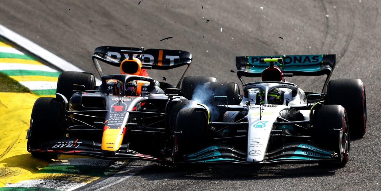 sao paulo, brazil   november 13 max verstappen of the netherlands driving the 1 oracle red bull racing rb18 and lewis hamilton of great britain driving the 44 mercedes amg petronas f1 team w13 collide during the f1 grand prix of brazil at autodromo jose carlos pace on november 13, 2022 in sao paulo, brazil photo by bryn lennon   formula 1formula 1 via getty images