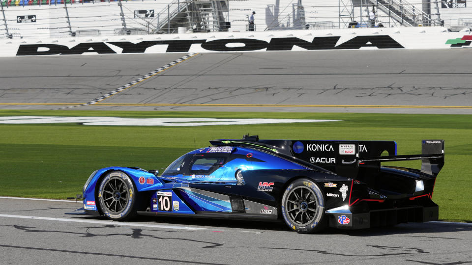 Filipe Albuquerque, of Portugal, takes the Acura ARX-06 down pit road during a practice session for the Rolex 24 hour auto race at Daytona International Speedway, Thursday, Jan. 25, 2024, in Daytona Beach, Fla. (AP Photo/John Raoux)