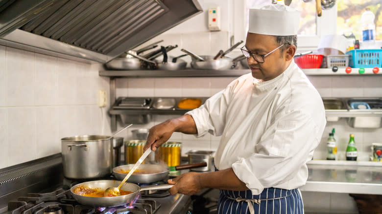 Professional chef making curry