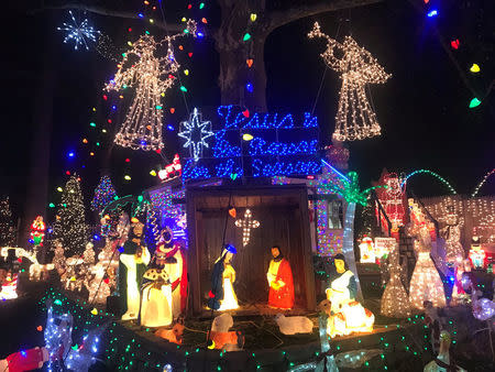 Christmas lights decorations are lit at the Halliwell family home in Roseville Terrace in Fairfield, Connecticut, U.S. on December 20, 2017. REUTERS/Mike Wood