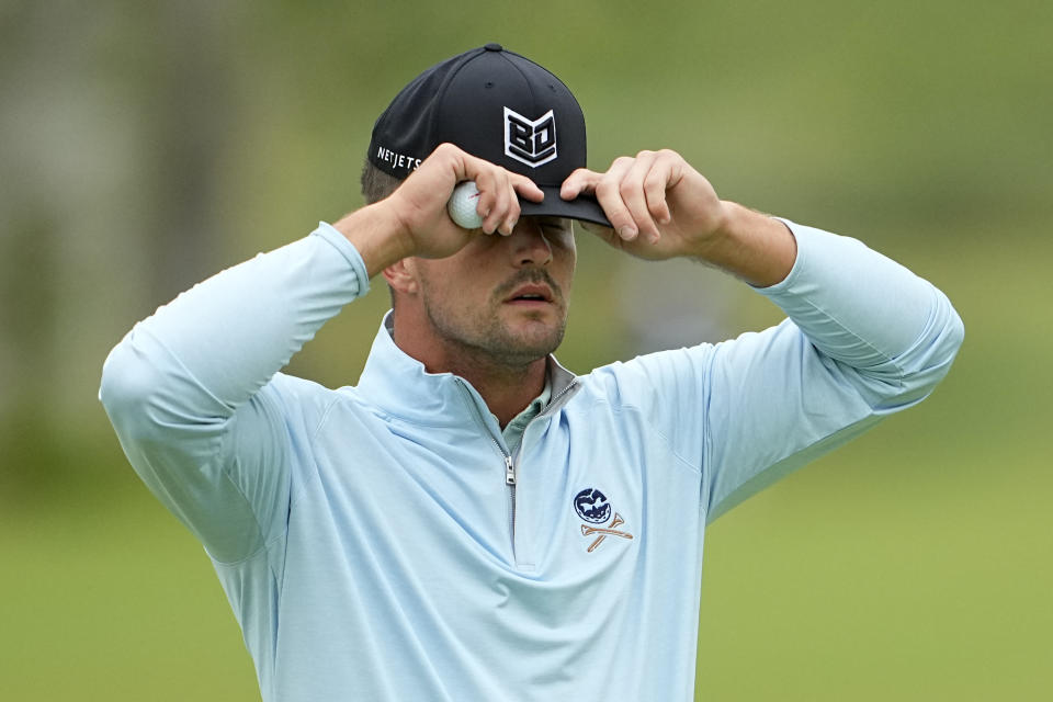 Bryson DeChambeau reacts after missing a putt on the 17th hole during the first round of the U.S. Open golf tournament at Los Angeles Country Club on Thursday, June 15, 2023, in Los Angeles. (AP Photo/Matt York)