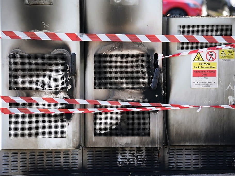 Fire and explosion damage can be seen on an EE network 5G mast that was attacked by an arsonist in Liverpool on 28 May, 2020  (Getty Images)