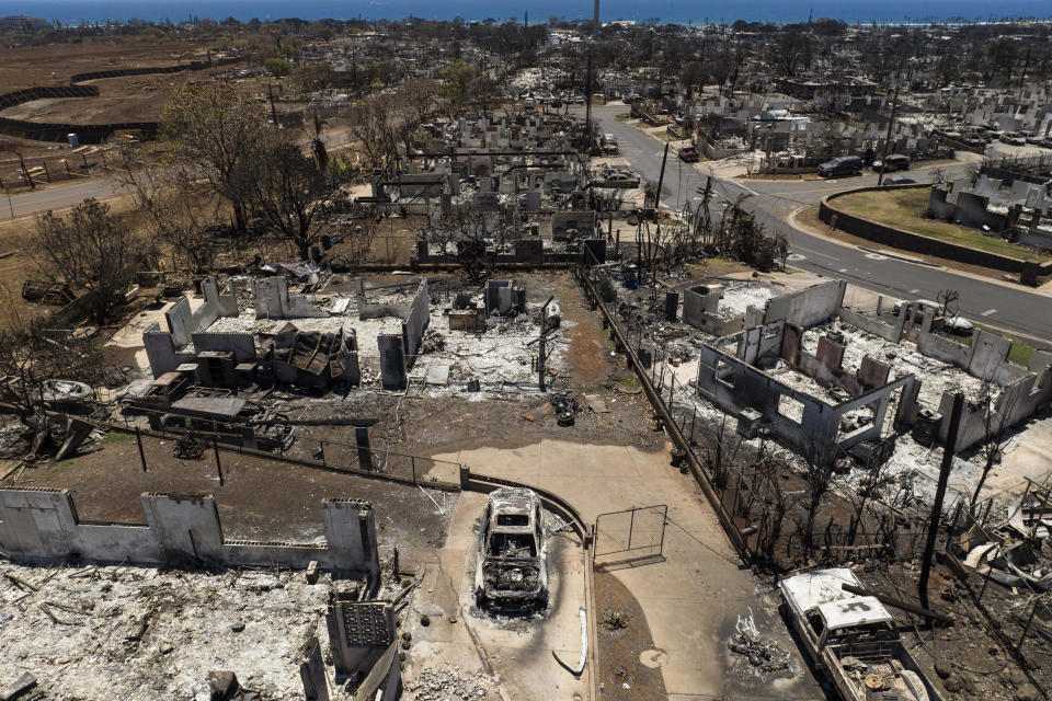 A general view shows the aftermath of a devastating wildfire in Lahaina, Hawaii, Tuesday, Aug. 22, 2023. Two weeks after the deadliest U.S. wildfire in more than a century swept through the Maui community of Lahaina, authorities say anywhere between 500 and 1,000 people remain unaccounted for. (AP Photo/Jae C. Hong)