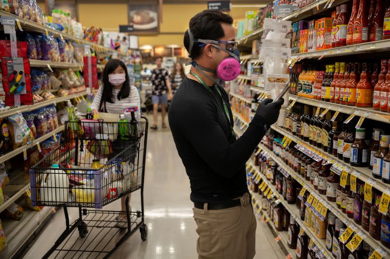 Instacart employee Eric Cohn works amid the coronavirus outbreak