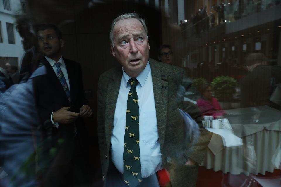 Alexander Gauland, who was a co-lead candidate of the right-wing Alternative for Germany (AfD) party in the German federal elections, is seen through glass following a news conference in Berlin on Sept. 25, 2017. At the conference, AfD member Frauke Petry announced she would quit the party in a surprise move.