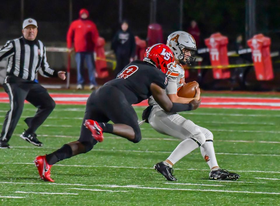 JJ Ruffin (8) of La Salle sacks Jackson Kuhn (12) of Anderson during a OHSAA playoff game Friday, Oct. 30, 2020, at La Salle High School