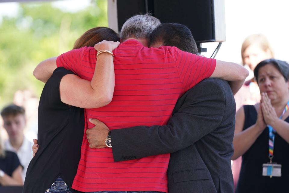 Grace O'Malley Kumar's father (right) and Barnaby Webber's parents embrace during a vigil at the University of Nottingham after they and Ian Coates were killed and another three hurt in connected attacks on Tuesday morning. Picture date: Wednesday June 14, 2023.