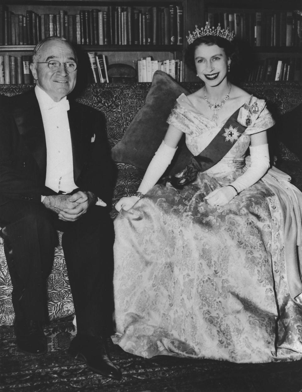 The Queen, as Princess Elizabeth, is pictured with president Truman of the United States, at the Canadian Embassy in Washington, D.C., Nov. 1, 1951.  She did not become Queen of England until after the death of her father, King George VI,  in February 1952.