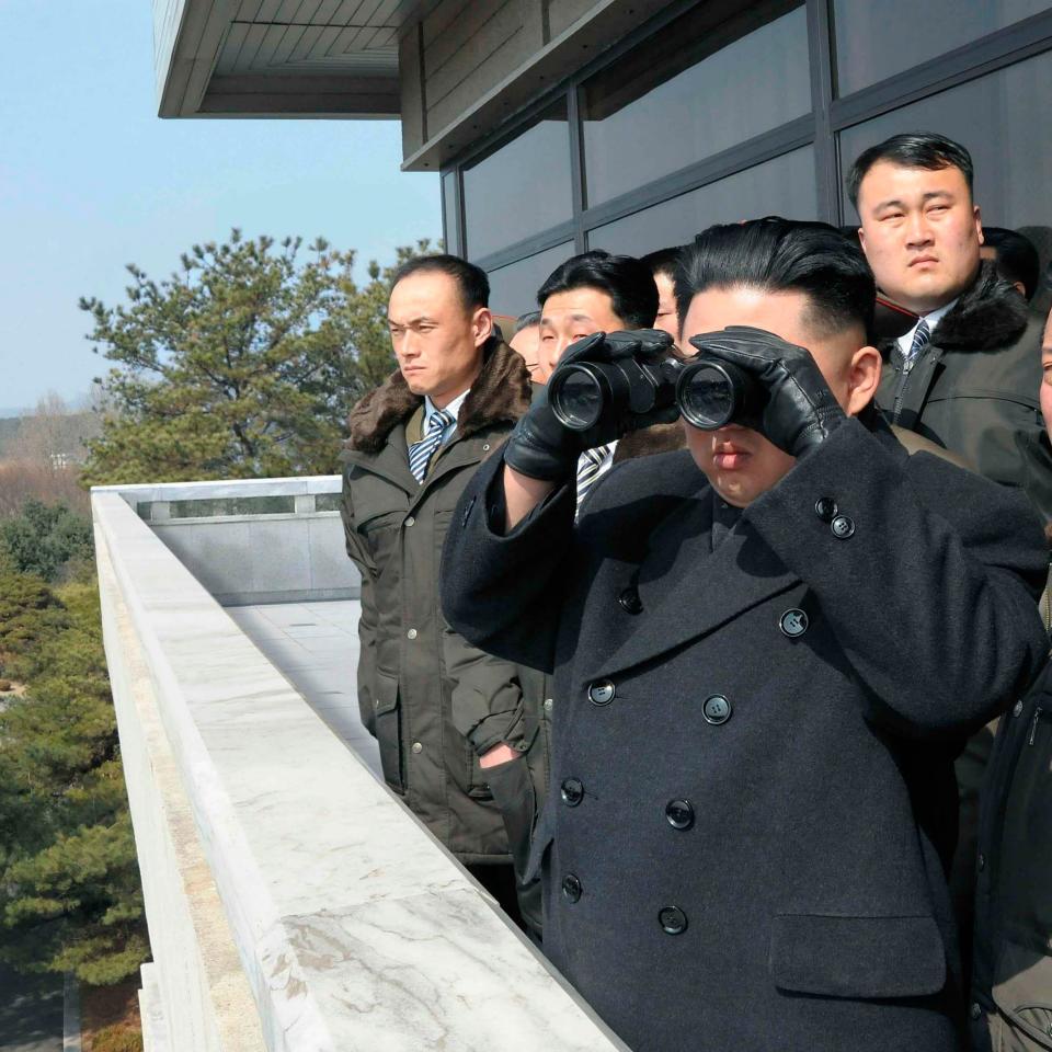 kim with binoculars - Credit: reuters