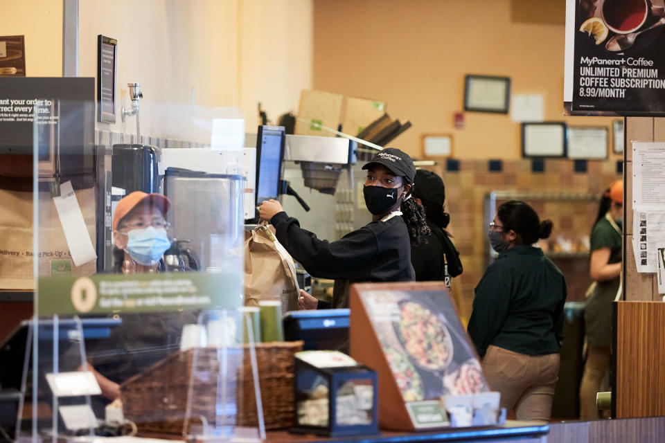 Joseph readies a takeout order at Panera Bread café in Bay Shore, N.Y.<span class="copyright">Mohamed Sadek for TIME</span>