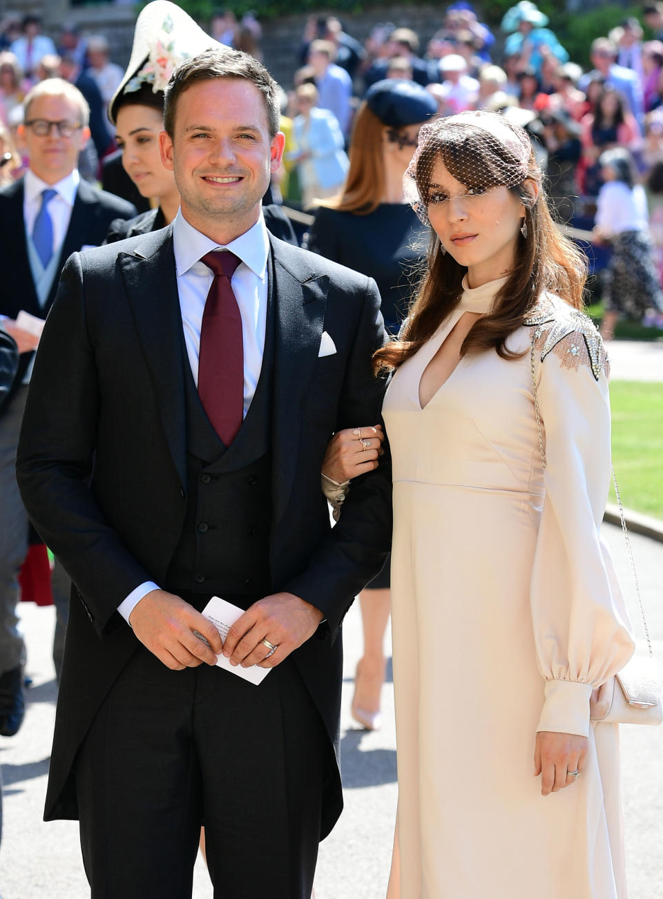 Meghan Markle's friend, US actor Patrick J. Adams and wife Troian Bellisario arrive for the wedding ceremony of Britain's Prince Harry, Duke of Sussex and US actress Meghan Markle at St George's Chapel, Windsor Castle, in Windsor, on May 19, 2018. (Photo by Ian WEST / POOL / AFP)        (Photo credit should read IAN WEST/AFP via Getty Images)