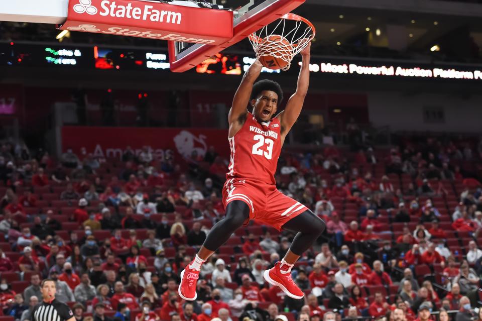 Jan 27, 2022; Lincoln, Nebraska, USA; Wisconsin Badgers guard Chucky Hepburn (23) dunks against the Nebraska Cornhuskers in the second half at Pinnacle Bank Arena. Mandatory Credit: Steven Branscombe-USA TODAY Sports