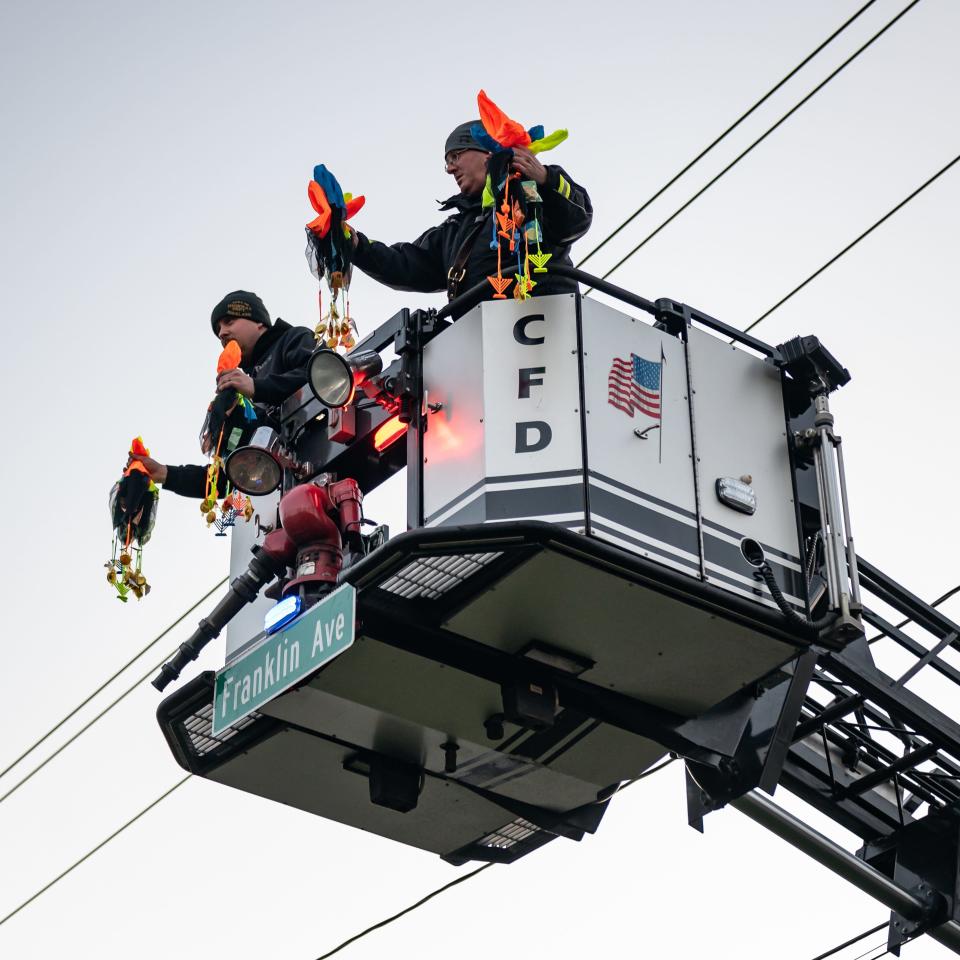 The Clinton Fire Department helped during the Gelt Drop at Chabad of Clinton's annual Menorah Lighting in Clinton, NY on Tuesday, December 12, 2023.