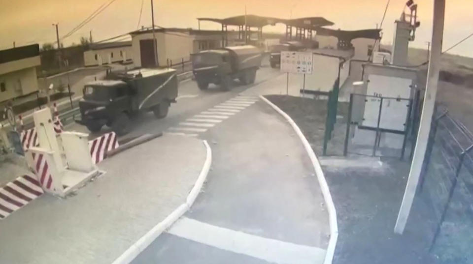 This CCTV image released on February 24, 2022 by the Ukrainian Border Guard Committee shows Russian military equipment crossing Crimea border checkpoint.   Ukrainian Border Guard Committee releases CCTV images of Russian military equipment crossing a border checkpoint in Crimea. 