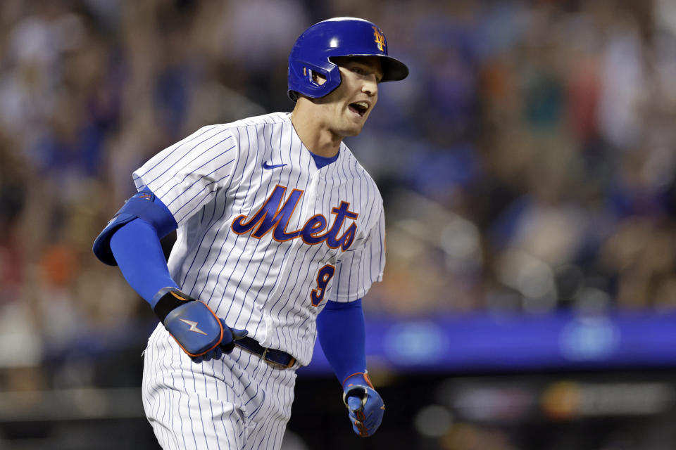 New York Mets' Brandon Nimmo reacts after hitting a home run during the first inning of a baseball game against the Colorado Rockies on Saturday, Aug. 27, 2022, in New York. (AP Photo/Adam Hunger)