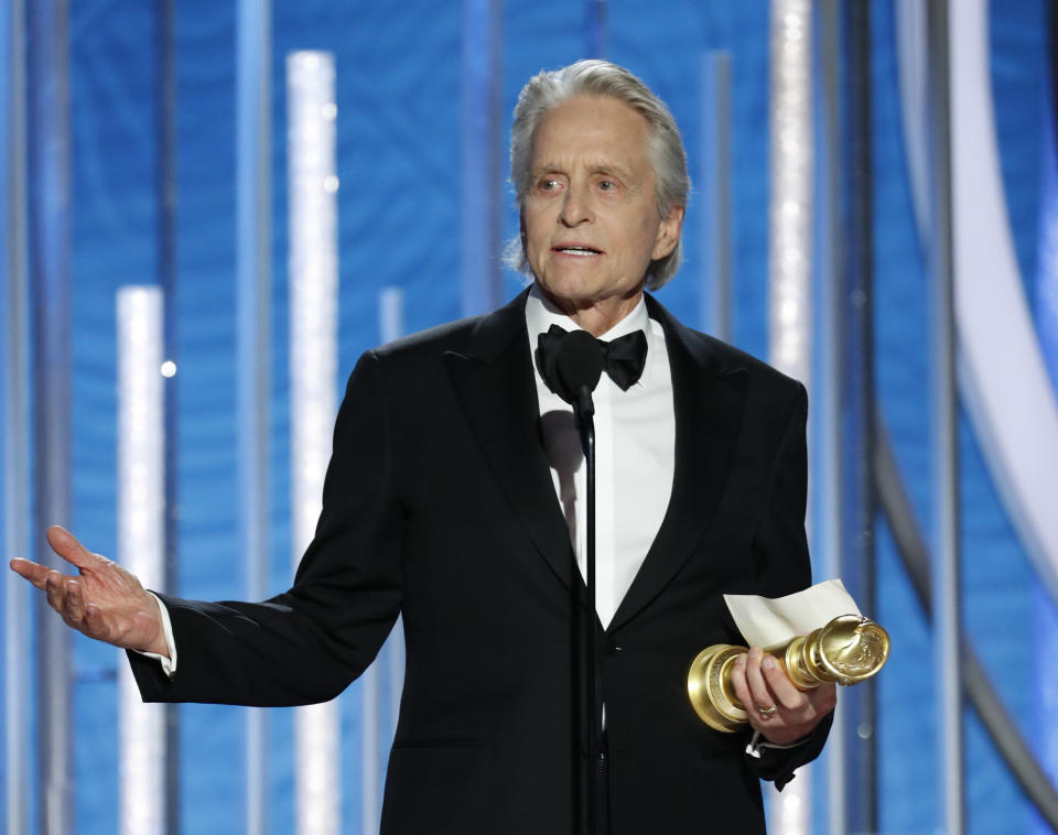 This image released by NBC shows Michael Douglas, winner of best actor in a TV series, musical or comedy for his role in "The Kominsky Method" at the 76th Annual Golden Globe Awards at the Beverly Hilton Hotel, Sunday, Jan. 6, 2019 in Beverly Hills, Calif. (Paul Drinkwater/NBC via AP)