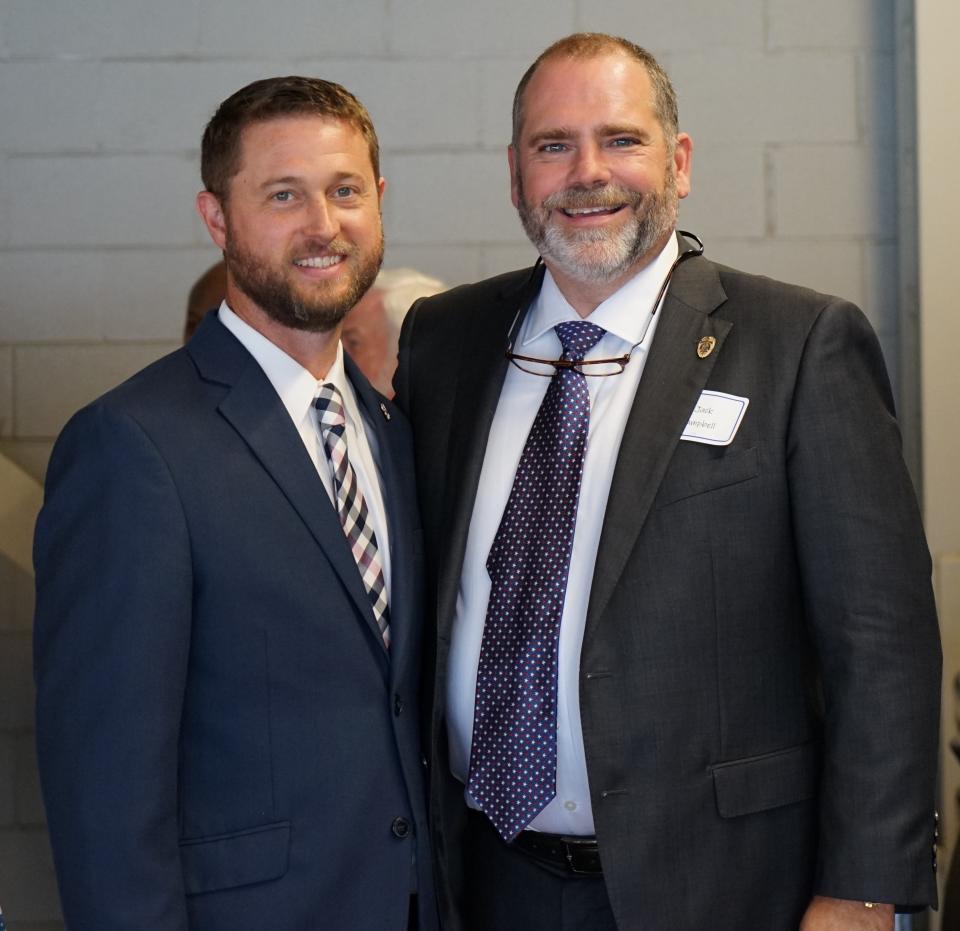 State Attorney Jack Campbell, right at the local Suwannee River Area Council of the Boy Scouts of America's annual Golden Eagle Dinner held in May.