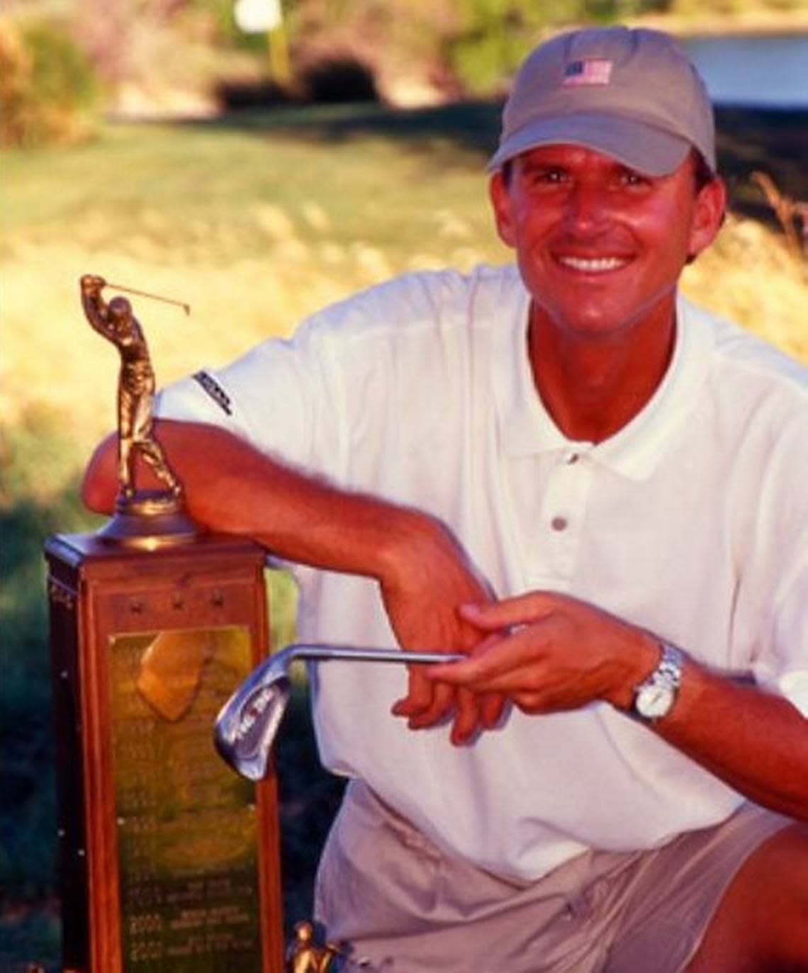 Salina native Bryan Norton has enjoyed a stellar golf career. He played professionally on the PGA Tour and for several years in Europe and was a highly decorated amateur. Here he is with his 2002 Kansas Amateur trophy.