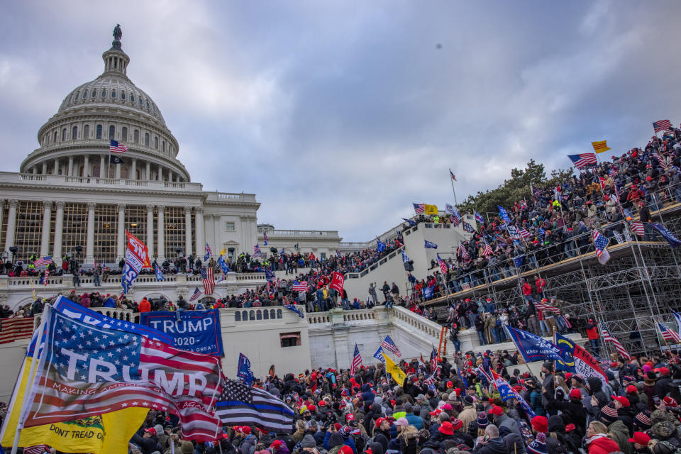 Supporters of then-President Donald Trump storm the U.S. Capitol on Jan. 6. (Photo: Evelyn Hockstein for The Washington Post via Getty Images)